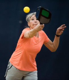 Miriam Morrison hits the ball at JF Hurley YMCA's Pickleball Tournament on March 24, 2018. (Photo by Rebecca Benson)